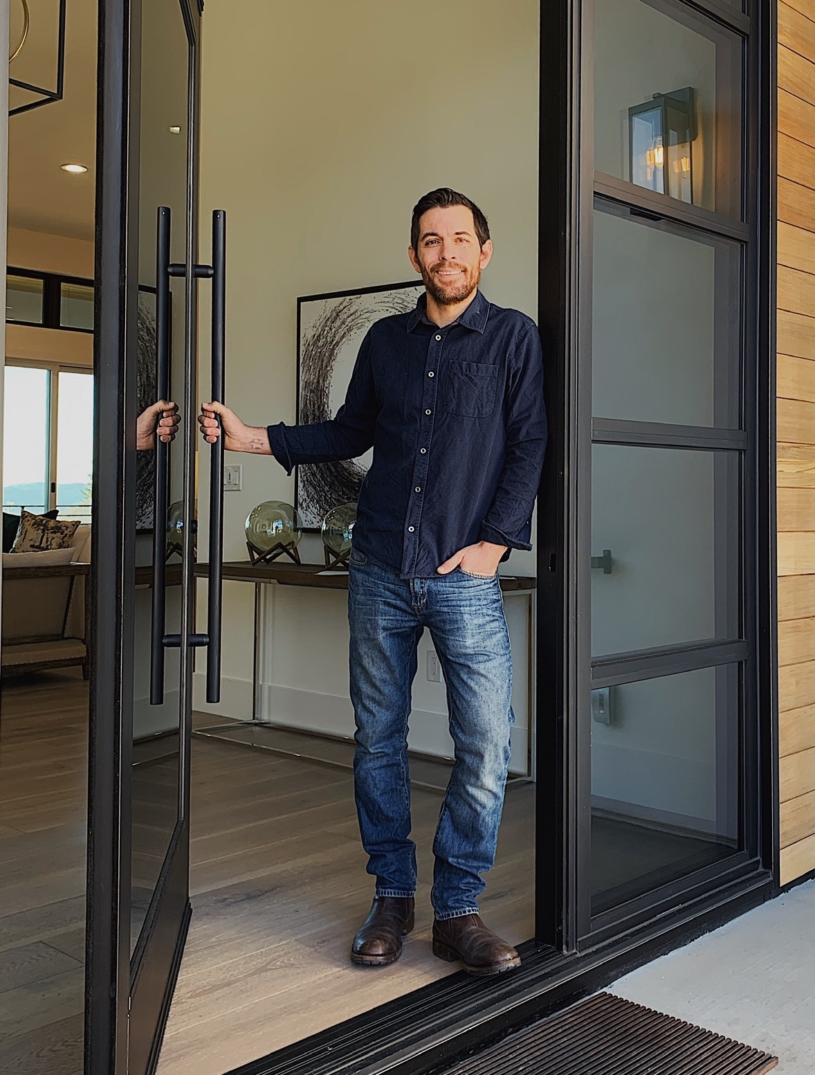 a man standing in front of a door