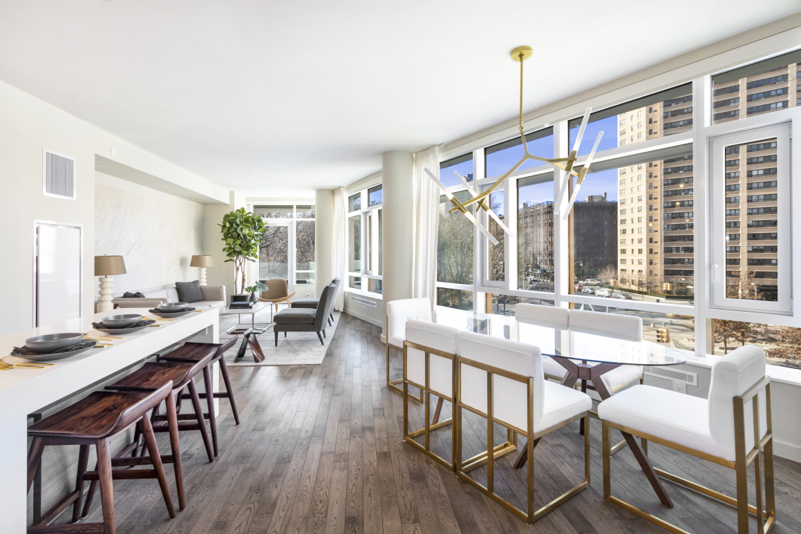 285 W 110th St 4-G New York, New York Measuring approximately 2,113 square feet, this four bedroom, three and a half bathroom apartment boasts beautiful curved glass windows allowing for plenty of sunshine and fabulous views of Central Park and Frederick Douglass Circle.
The open floor plan is fantastic for entertaining and includes two separate balconies. The kitchen comes clad with Lagos blue stone countertops and a large white quartz island. It is outfitted with top of the line custom Italian cabinetry and Kohler fixtures. There is a gas cooktop, oven, microwave and dishwasher, all by Bosch, as well as a custom paneled SubZero refrigerator. Adjacent to the kitchen is the dining area, living area and den or fourth bedroom. These spaces face south and west, offering gorgeous sunsets in the evening that can be enjoyed on the private balcony.
The three other bedrooms are located on the opposite side of the apartment. The master bedroom is home to another private balcony, as well as a large walk-in closet and en-suite bathroom. The five fixture bathroom has classic white marble tiles that are complemented by grey limestone mosaic tile accents and radiant heated floor. The bathroom is complete with a separate bathtub and glass enclosed shower, white lacquer vanity with double sink and illuminated medicine cabinet, all by Duravit as well as radiant heat floors. The bathroom's starlight chrome finished fixtures are all by Grohe.
The second bedroom also has an en-suite bathroom with a shower is and outfitted with an assortment of neutral-toned porcelain tiles. Across the hall is the third bedroom, with a similarly outfitted bathroom just outside in the hall. Other highlights of this apartment include a powder room at the entry, vented washer/dryer, central air and 3.5' brushed oak floors.
Located right across the street from Central Park on the Upper West Side, Circa is a brand new development condominium with spectacular, far-reaching park and city views. With a total of 38 residences, the glass building is designed to allow for an abundance of natural light throughout. Apartments here range in size from one to five bedrooms and include a selection of penthouses. Parking and storage are available for sale.
Circa boasts plenty of outdoor space including a landscaped courtyard and rooftop with grill. Other amenities here include a state-of-the-art gym, residents lounge, children's playroom, tween room, conference room with Mac computers, on-site parking with electric car charging stations, pet grooming station, resident storage and bicycle storage. With Central Park at your front door, scooters, remote control boats and a bike share program are all available to residents.
*25 year tax abatement, immediate occupancy.
The complete terms are in an Offering Plan available from the Sponsor file number CD 150033. Sponsor: Crescent 110 Equities, LLC. 316 West 118th Street, New York, New York 10026.